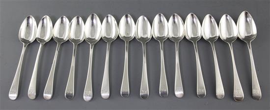 A harlequin set of fourteen George III silver Old English pattern dessert spoons, 13.5 oz.